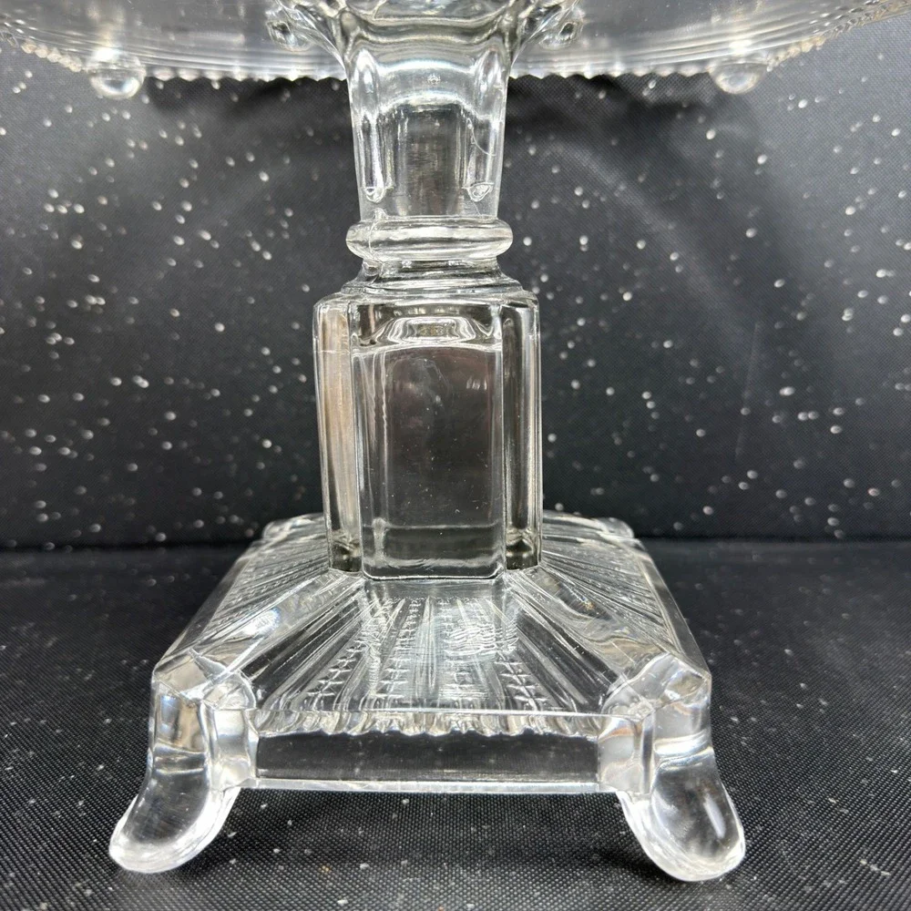 Antique Adams & Co Manganese Glow Glass Cake Stand 8in Tall 10in Wide Clear EAPG